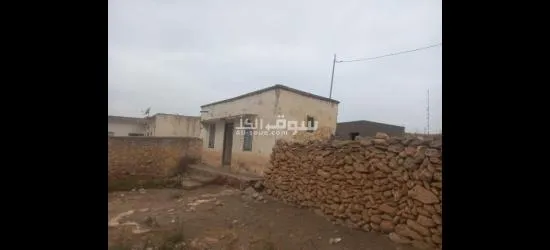 أرض بها بناية محفظة للبيع - 1